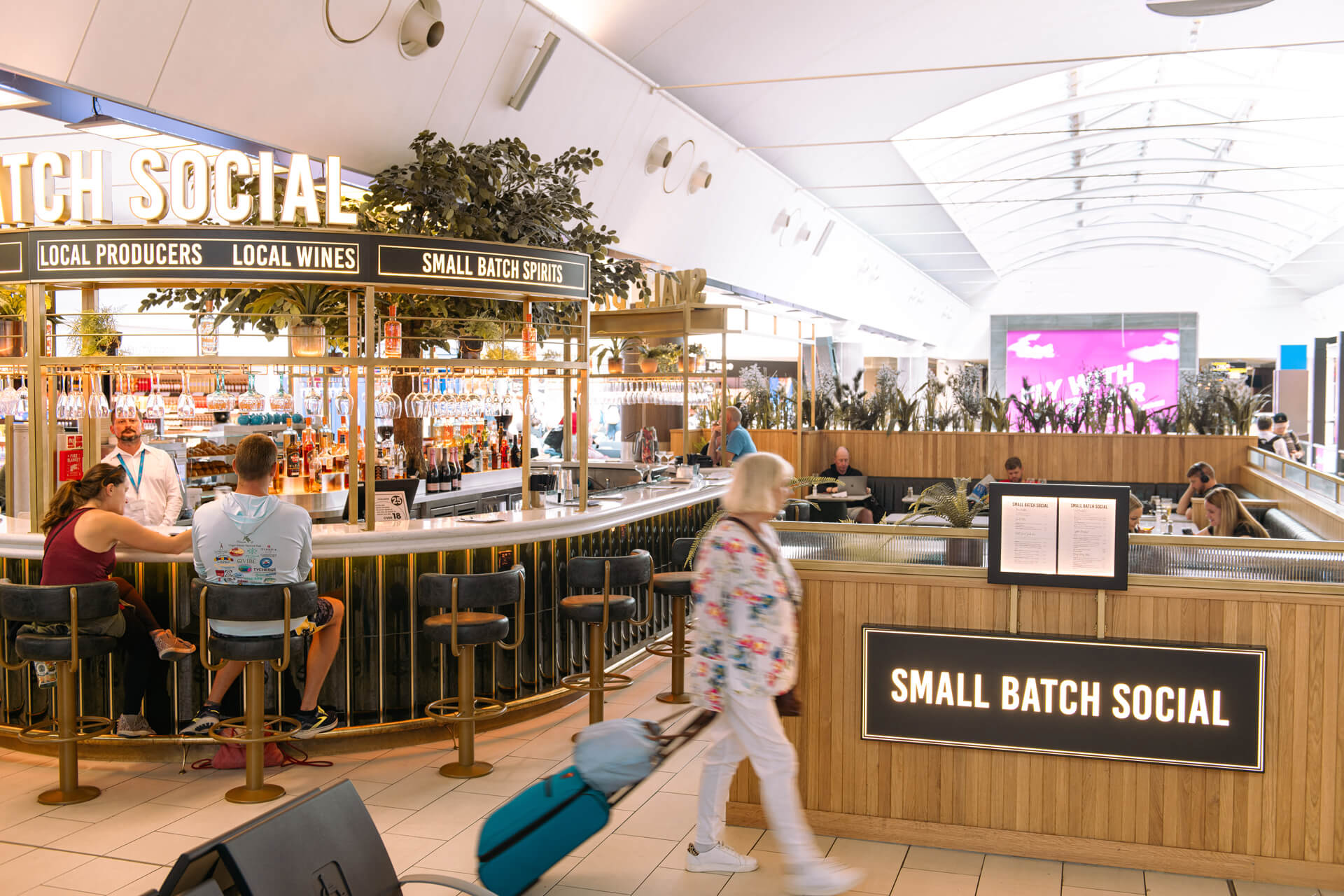 Guests at the bar in the departure lounge